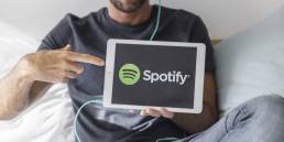 listening to Spotify on iPad, social media