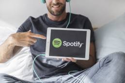 listening to Spotify on iPad, social media