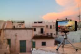 Iphone Camera on Tripod Recording Cityscape