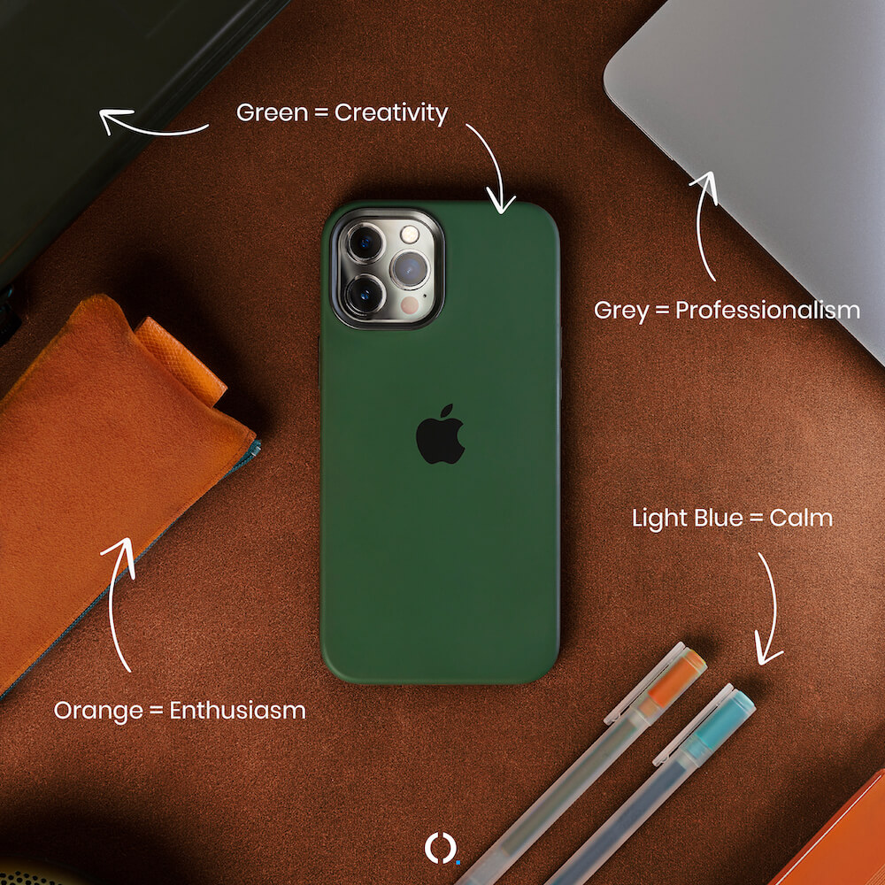 green iphone on desk
